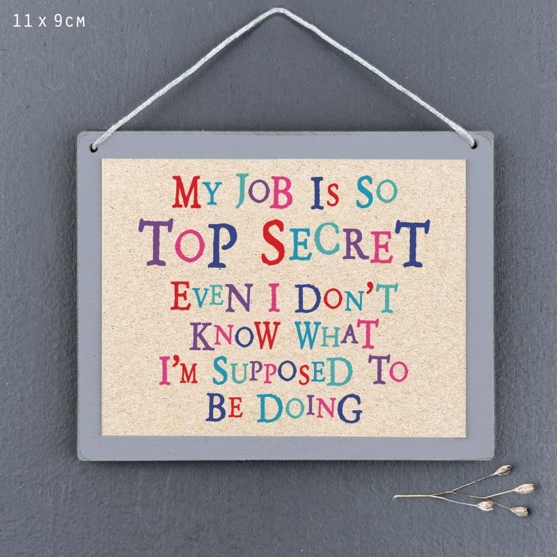 Sign-My job is so top secret even I don't know