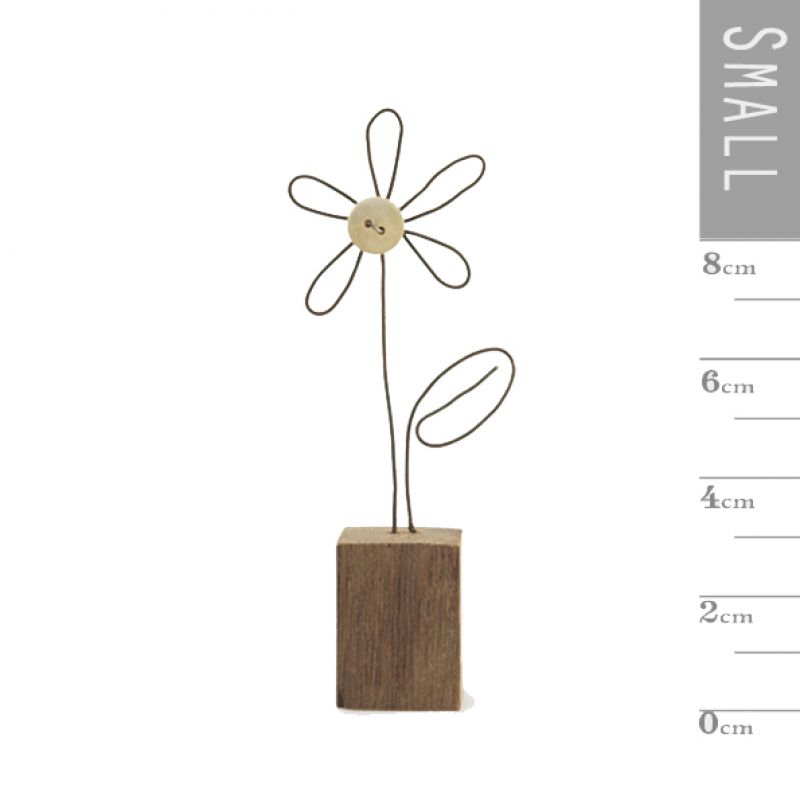 Wire flower in wooden block