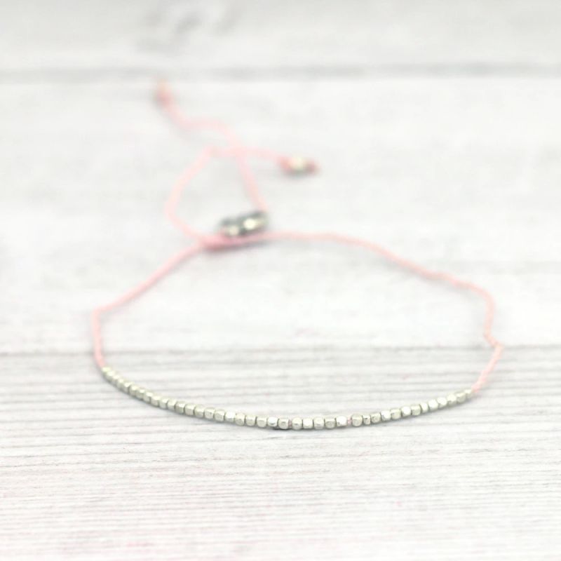 Centred coloured thread bracelet