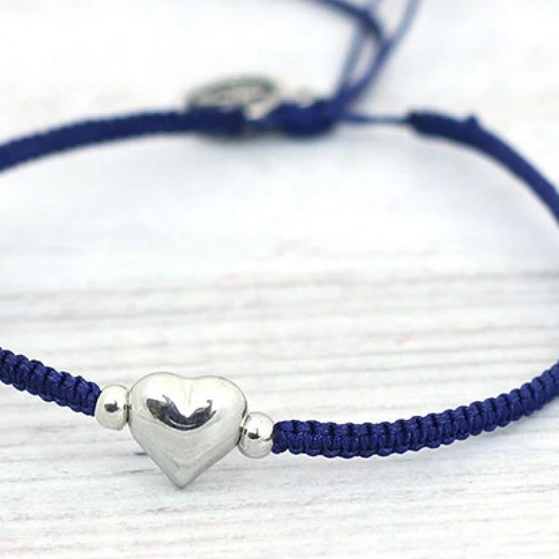 Handwoven bracelet with charm