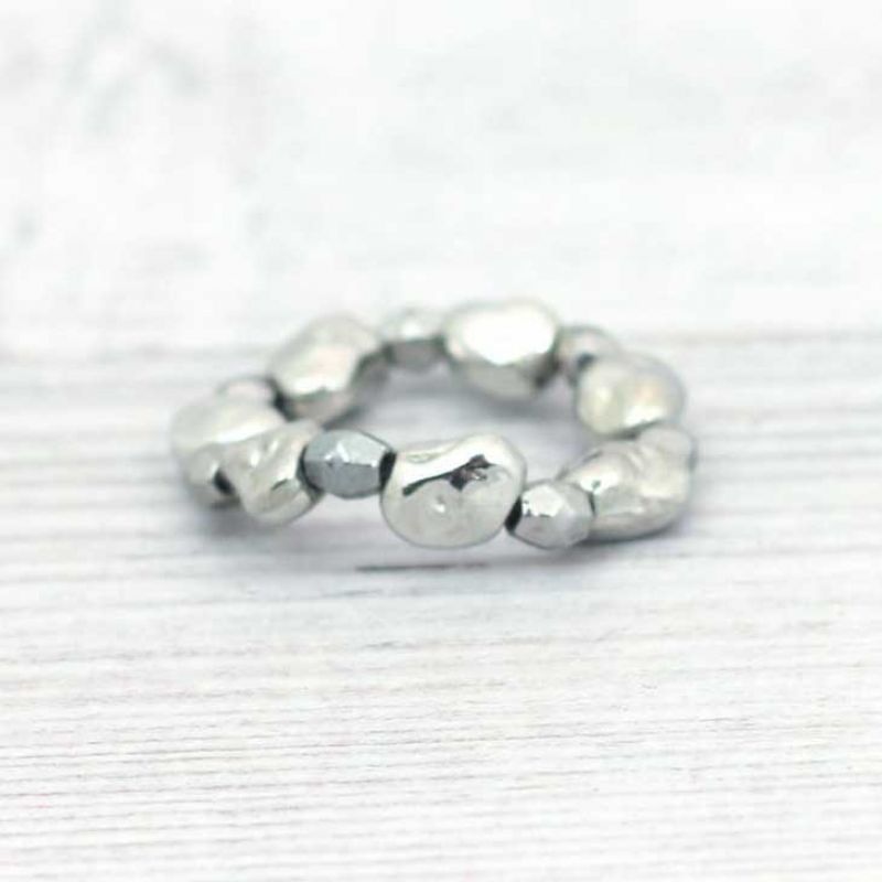 Elastic silver metal ring