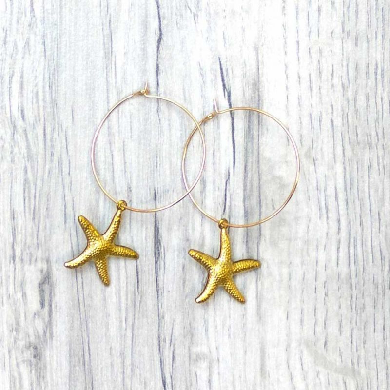Σκουλαρίκια αστερίας επίχρυσα
