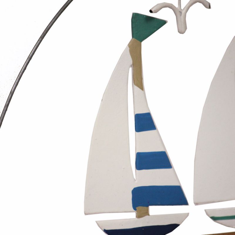 Stripey sail yachts on stick