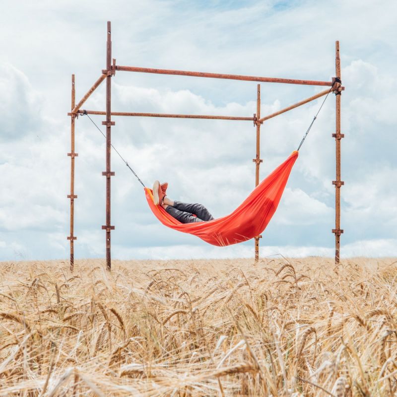 Orange & red hammock made from old silk parachutes