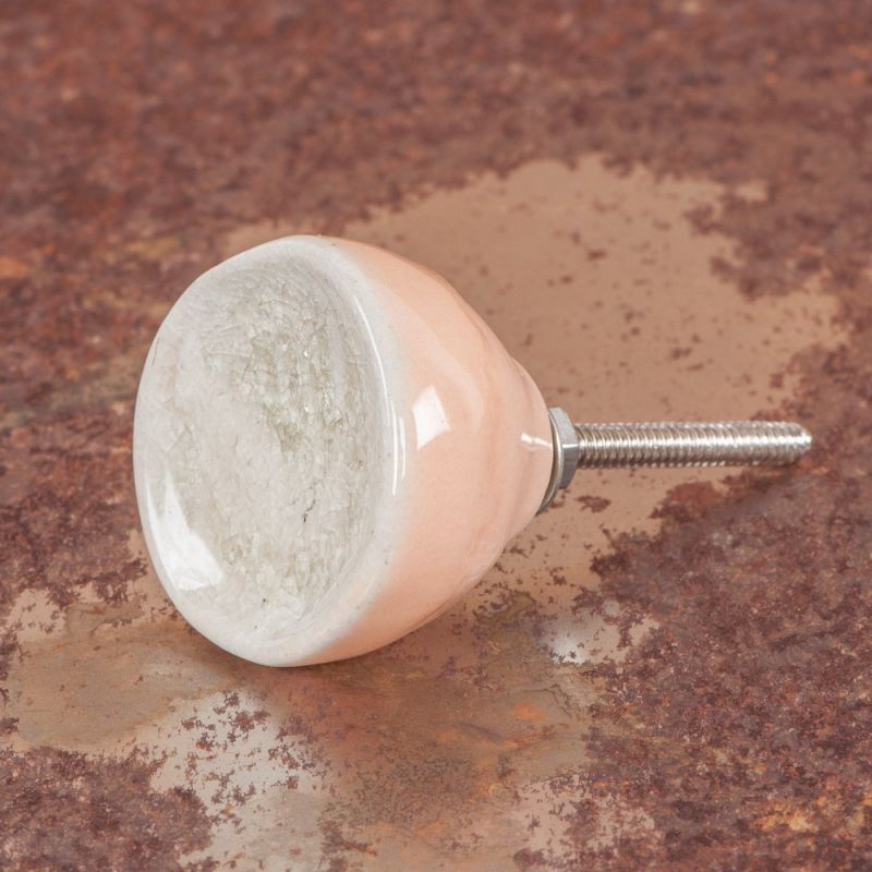 Natural/peach ceramic door knob with crackle glaze