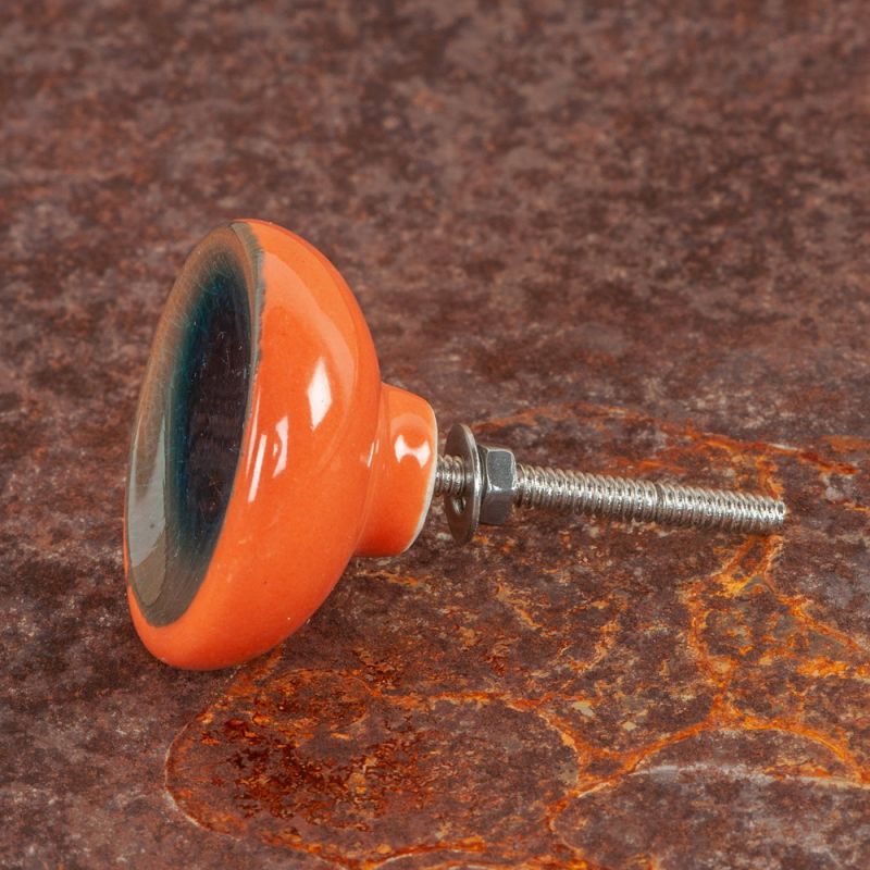 Teal/orange ceramic door knob with crackle glaze