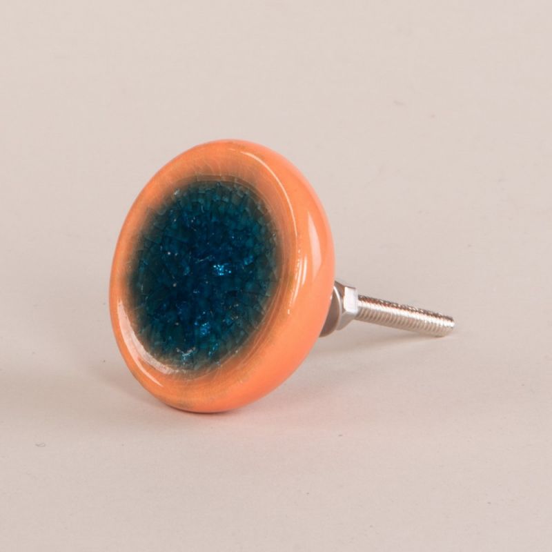 Teal/orange ceramic door knob with crackle glaze