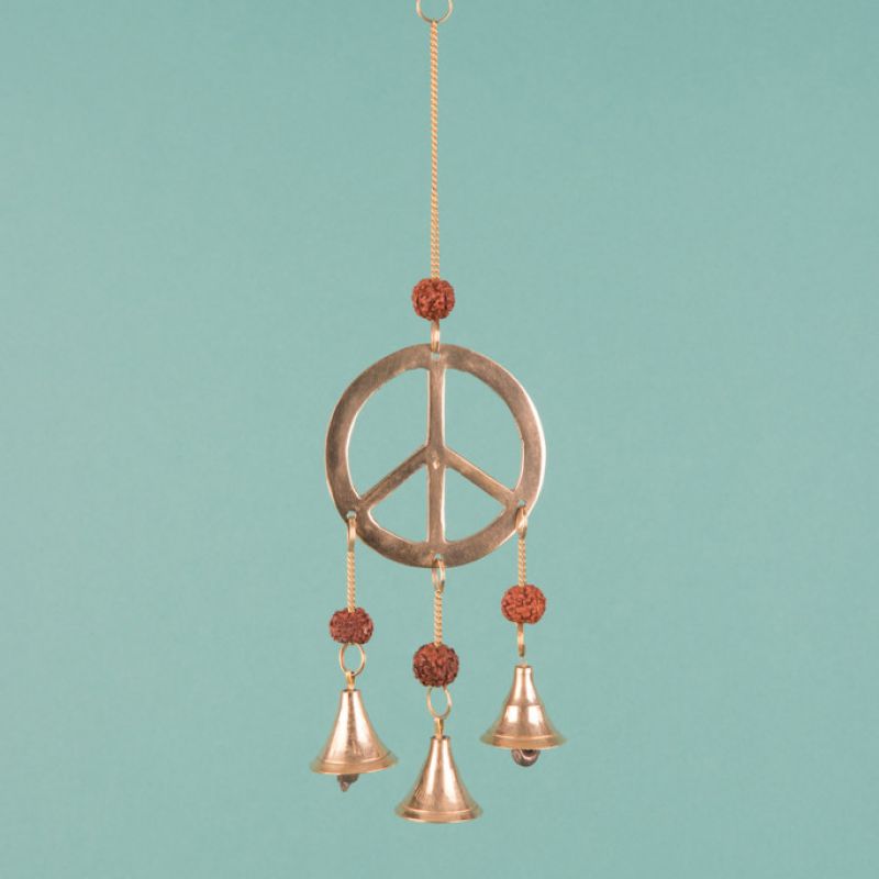 Hanging brass bell chimes peace sign