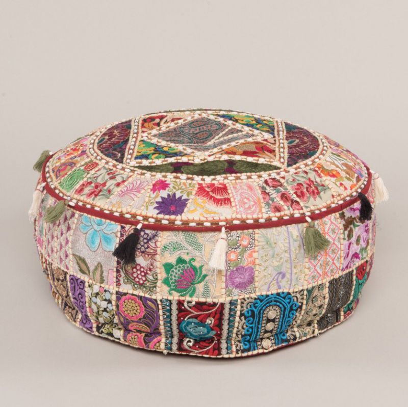 Patchwork pouffe made from old embroideries